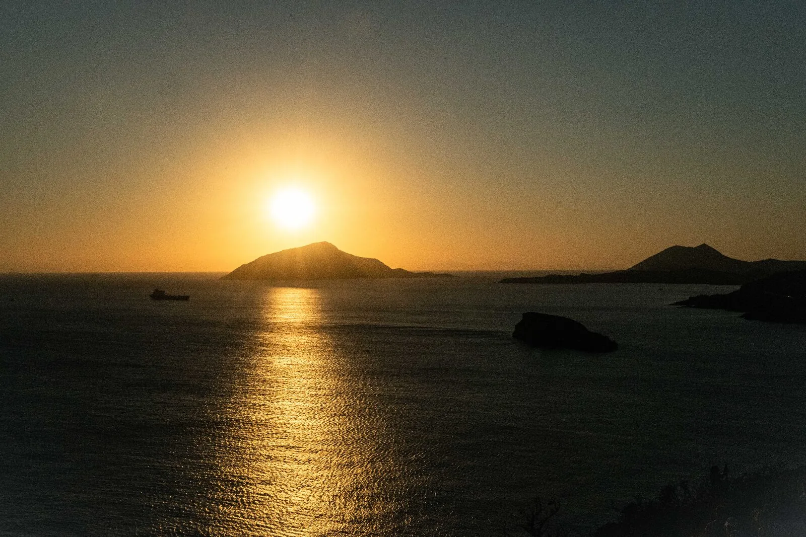 Sunset at Cape Sounion with temple silhouette