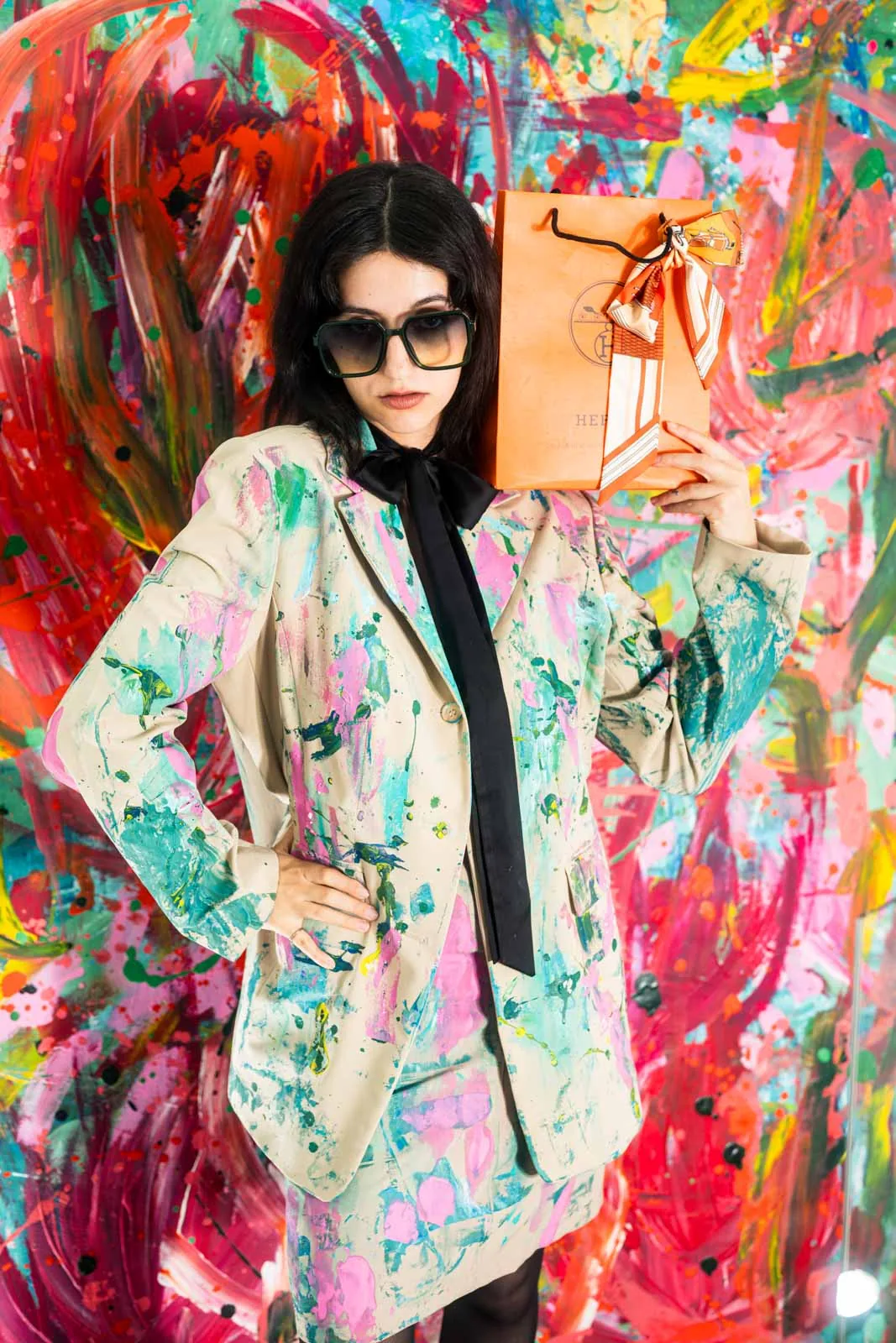 Editorial fashion image — paint splatter blazer, artistic styling