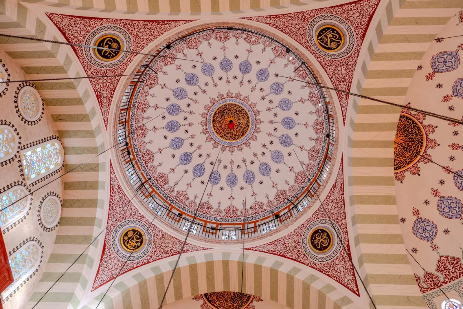 Mihrimah Sultan prayer hall flooded with natural light from large windows clean Ottoman architecture