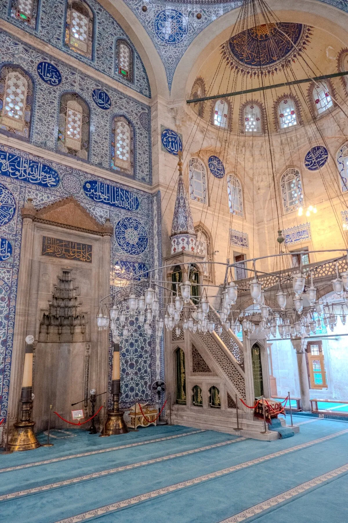 Sokollu Mehmed Pasha mihrab and minbar with blue Iznik tiles hanging chandelier dome and calligraphy by Mimar Sinan
