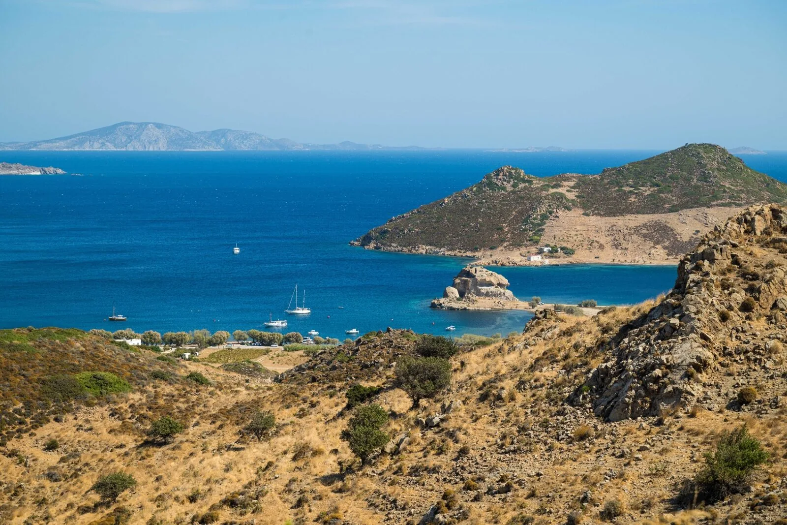 Coastal landscape with turquoise bay and surrounding islands
