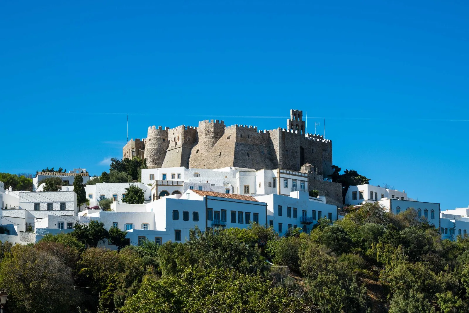 Sunset view over Patmos harbor with golden light