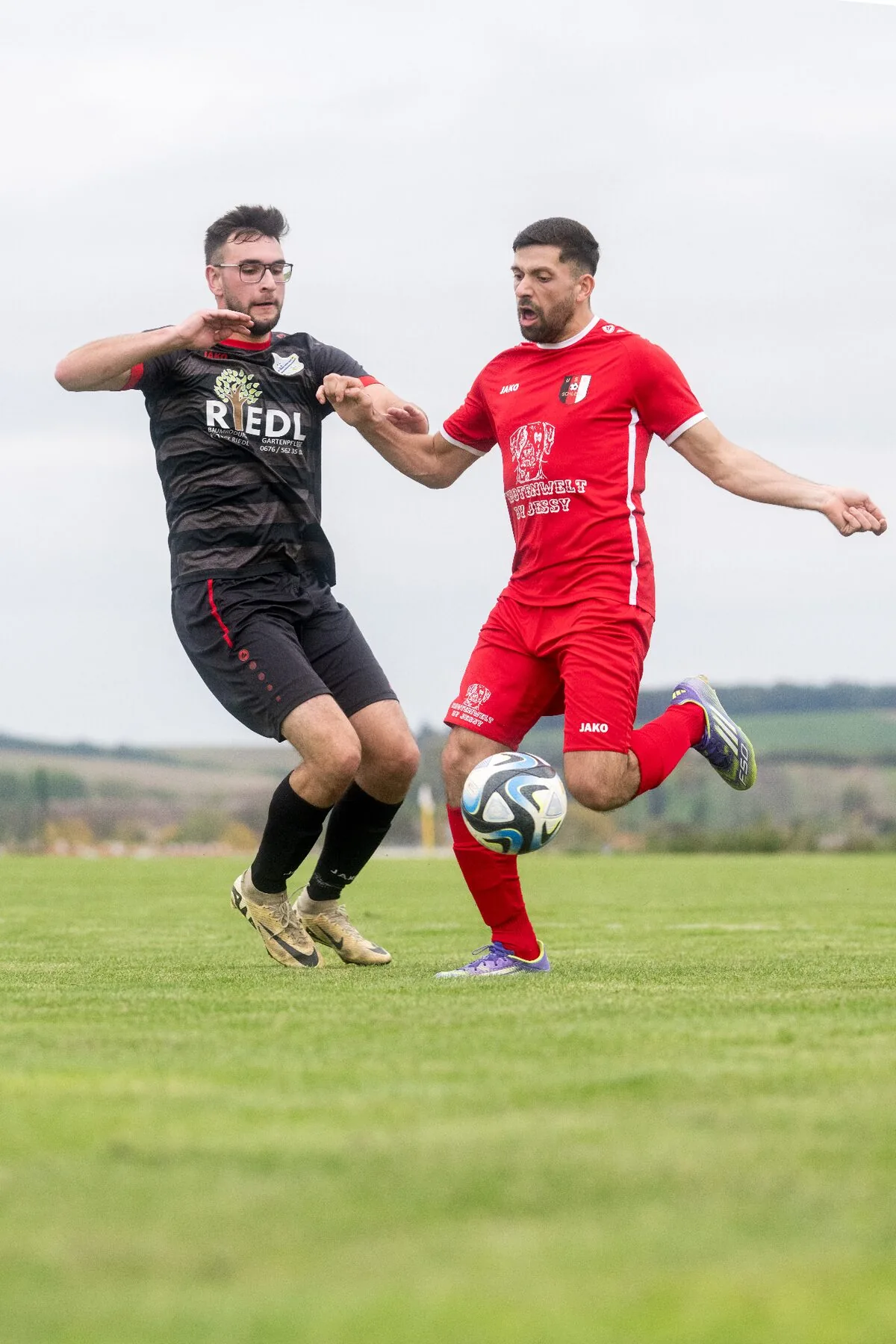 Sports photography NIKKOR 135mm Plena football autofocus precision