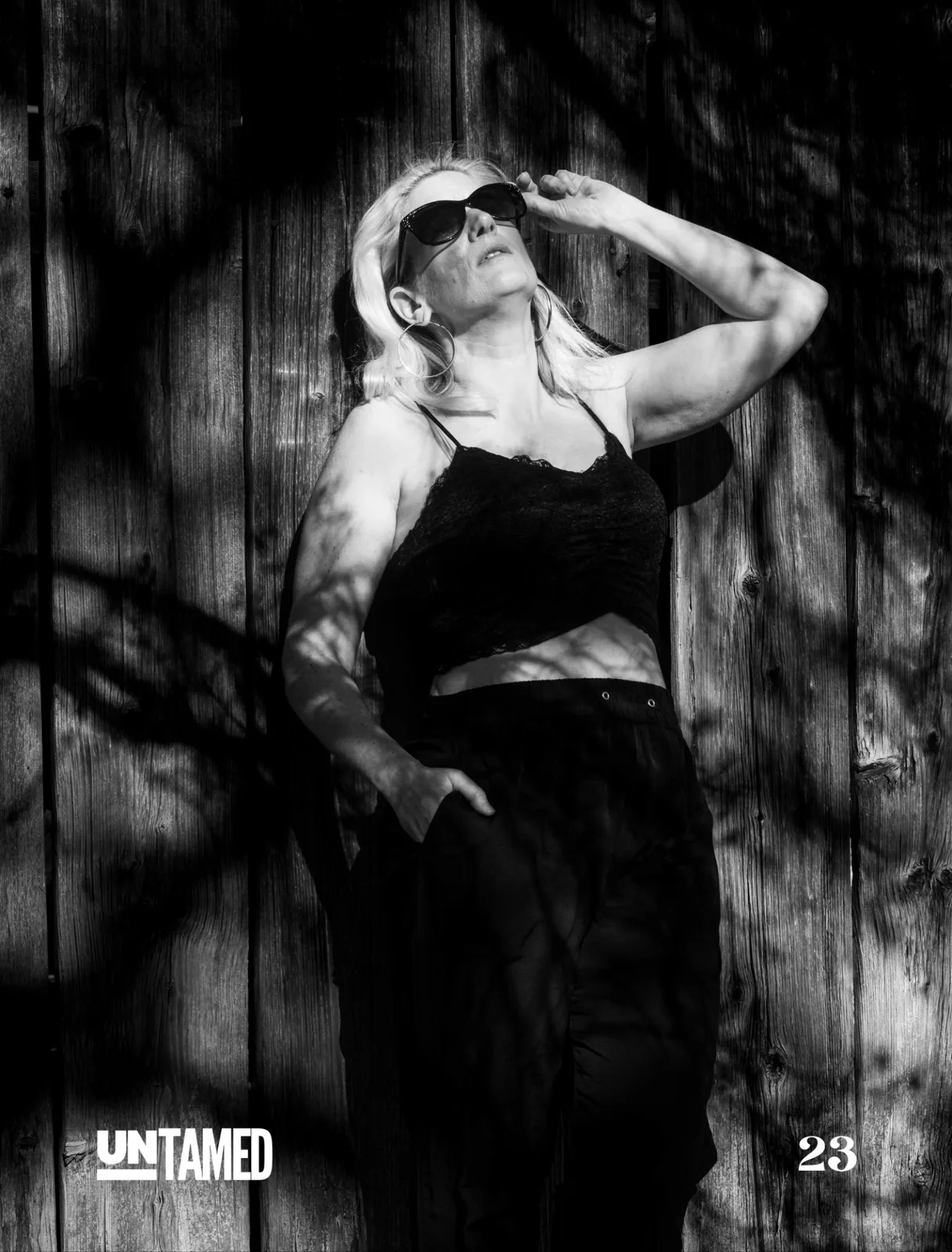 Untamed Fashion Vol. 277 page 22-23 — dramatic black and white portrait emphasizing gesture, shadow and shape