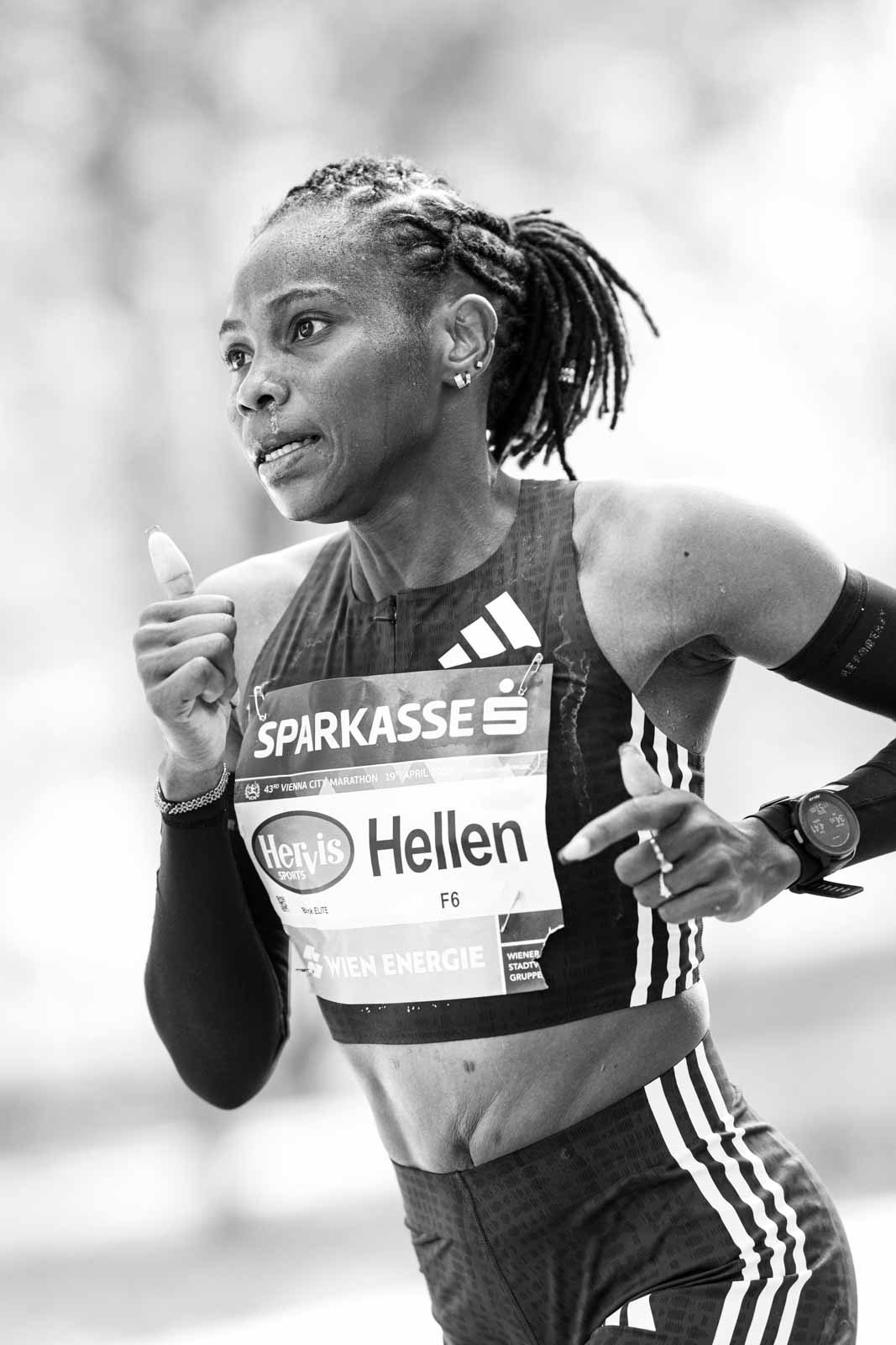 Female elite marathon runner Hellen in motion at the Vienna City Marathon — black and white fine art photography by schopho